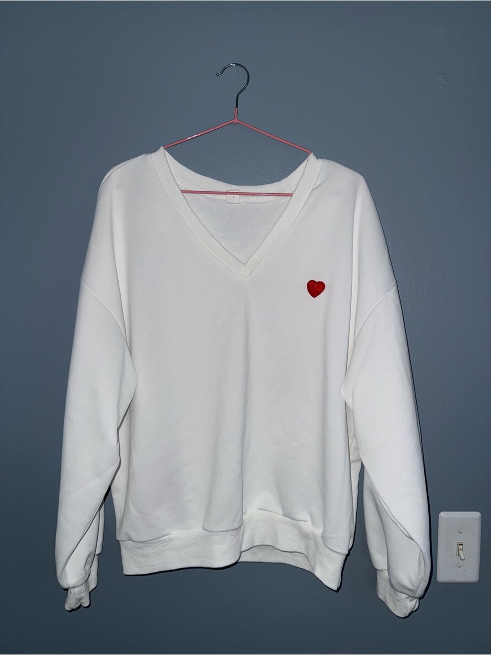 White V-Neck Sweatshirt with Red Heart Patch large